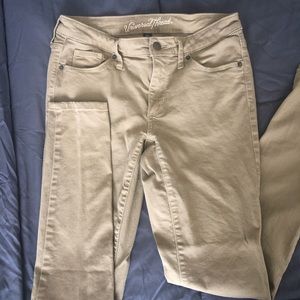 SOLD Tan skinny jeans midrise